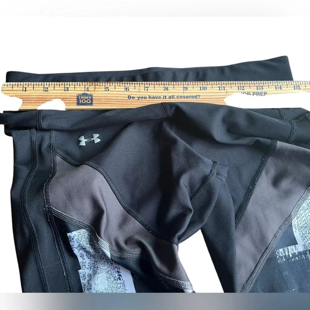 Under Armour women’s size, large Black and White Graphic Leggings